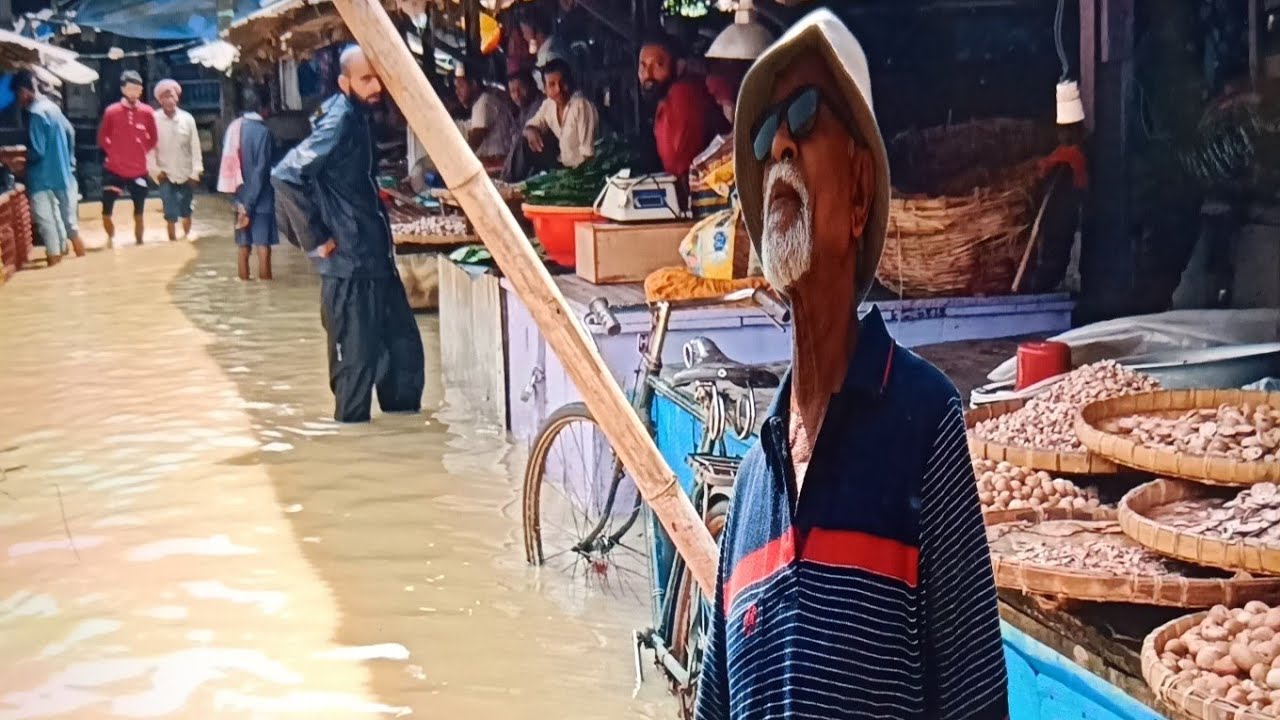 Karimganj market flooded.....বন্যা কবলিত করিমগঞ্জ বাজার। @nomadicbn3263