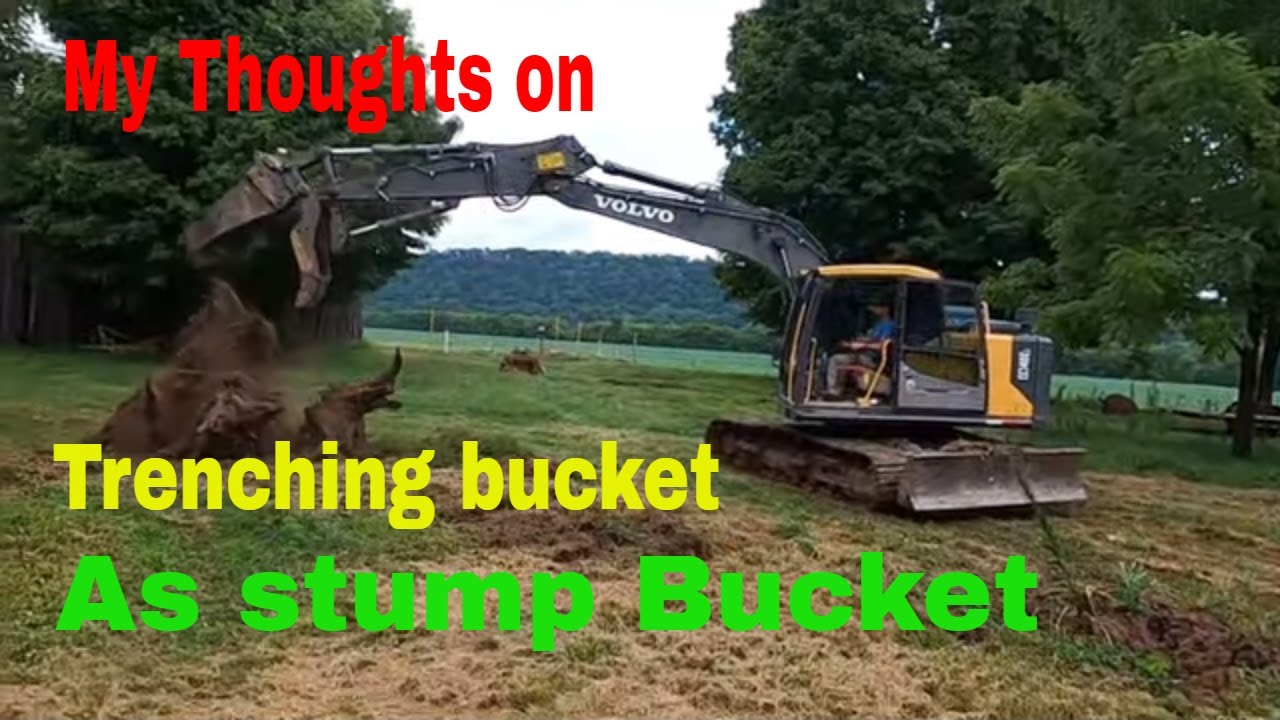 Putting the trenching bucket to the test as a stump bucket  have a special film crew for this one 😀