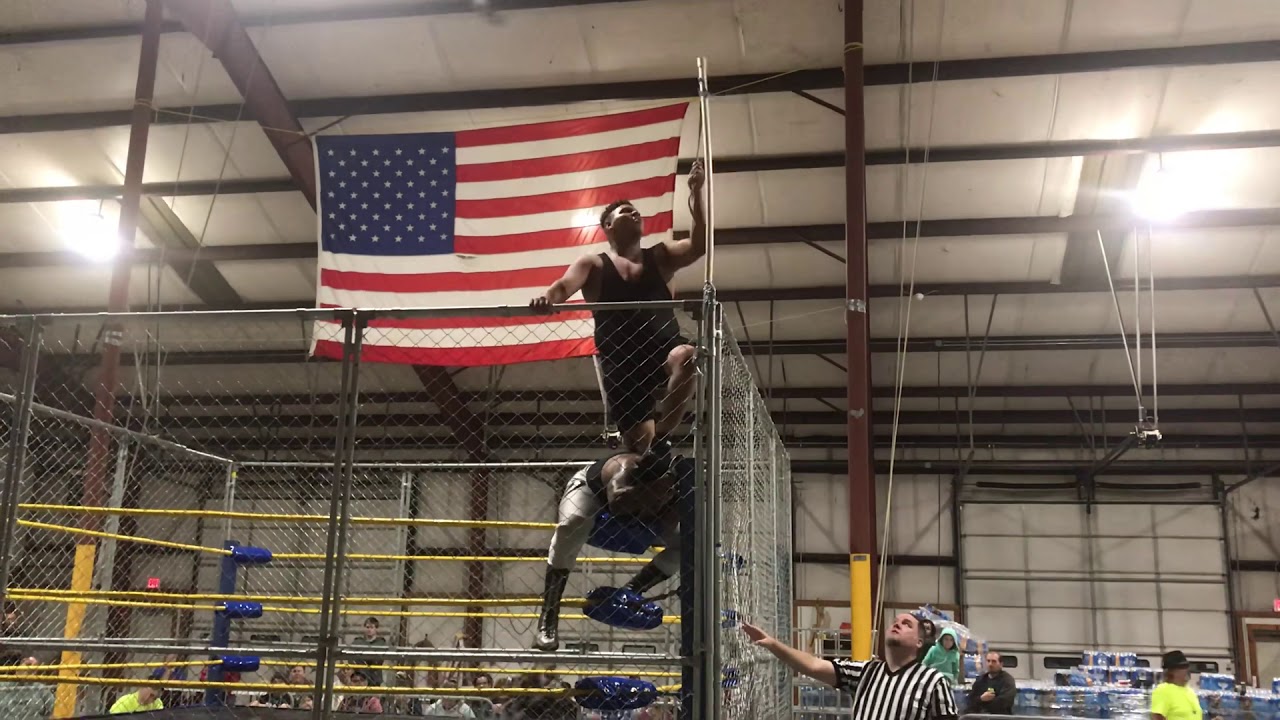 Mikey Banker (C) vs Dezmon King Steel Cage Strap Match