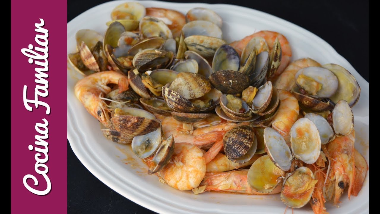 Como hacer almejas con langostinos en salsa picante. Recetas para Navidad