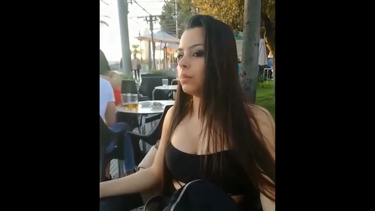 Sexy Girl Chainsmoking in Public