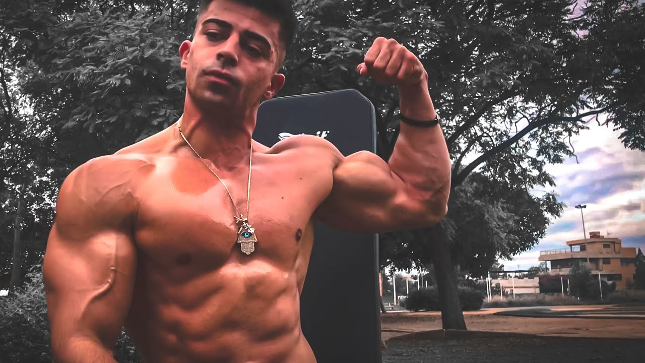 young bodybuilder showing his pumped muscle | flexing | muscle worship