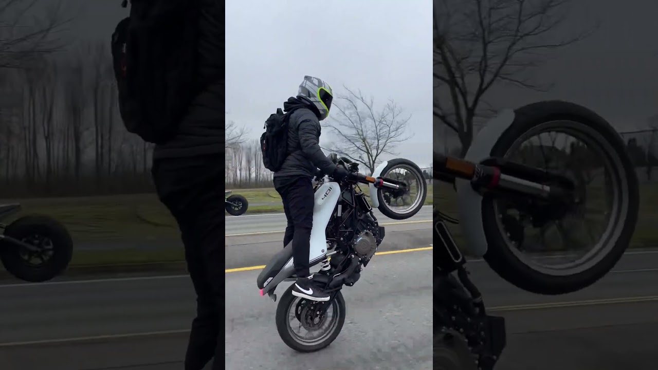 Foot Peg Wheelie on Vitpilen 401 🔥 #wheelie #stunt #vitpilen #husqvarna #motorcycle  #shorts