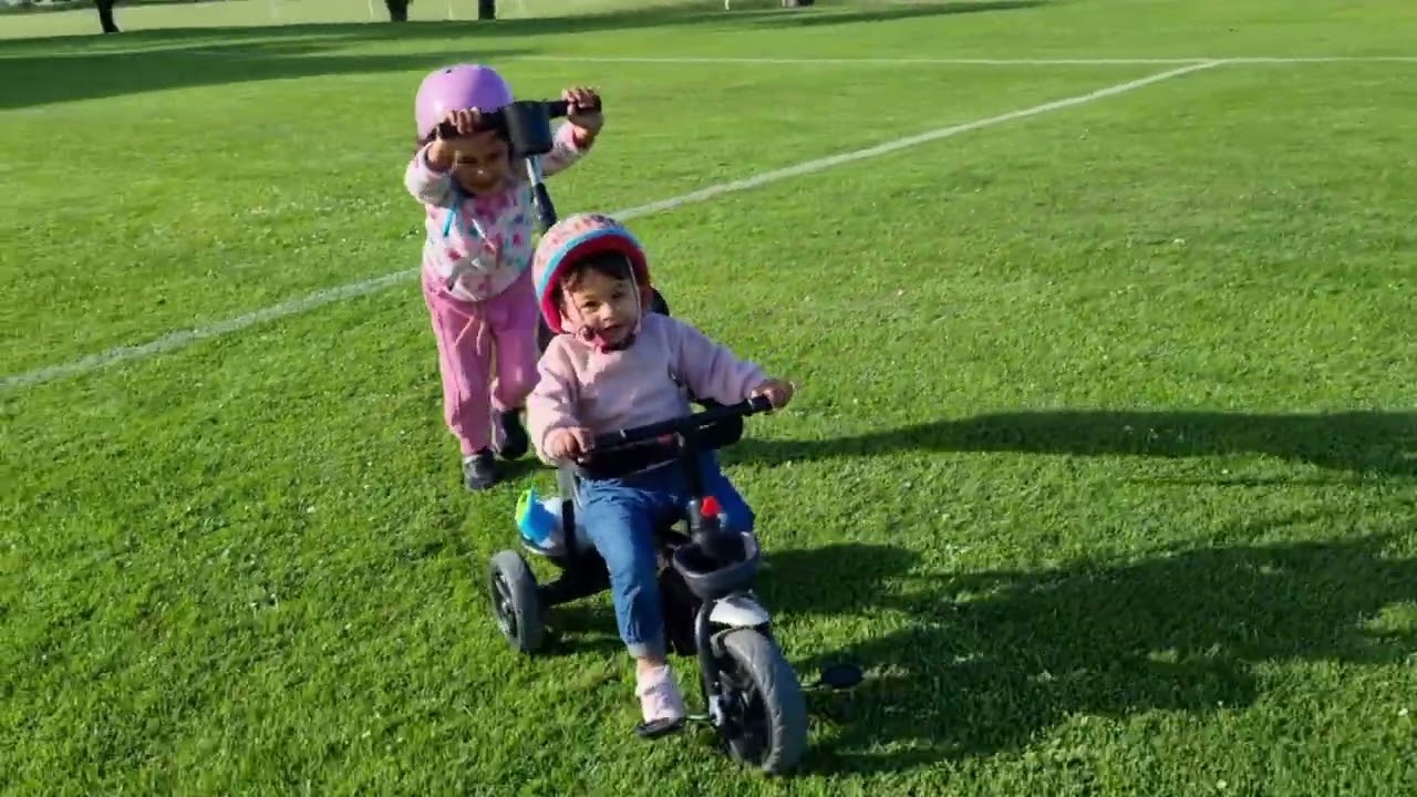 Evana and Eshani Enjoying riding bicycle in park 28/10/25