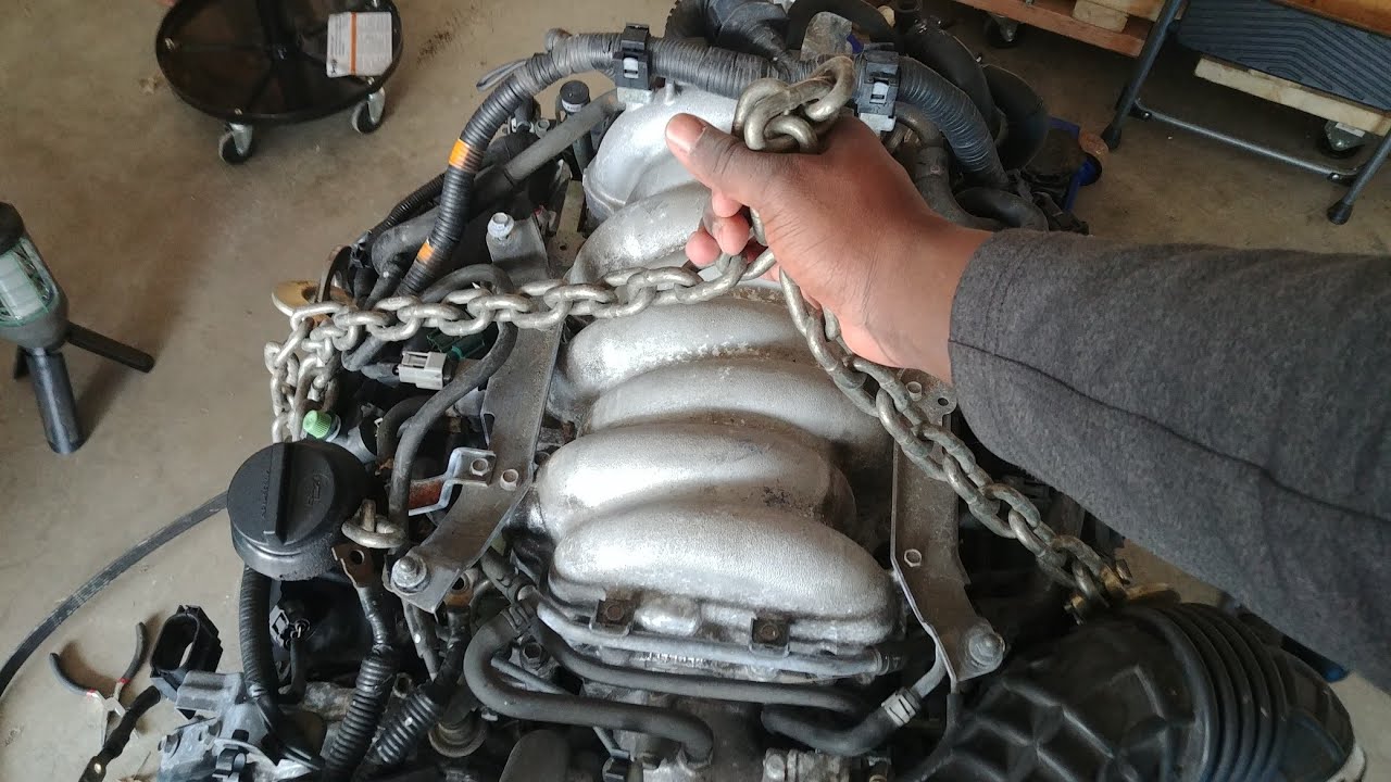 How to lift an engine securely. Custom hoist brackets. Nissan Infiniti V8 engine
