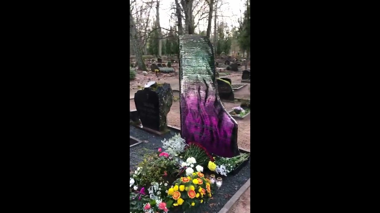 A beautiful glass monument in the shape of a grand piano dedicated to pianist – Jautrīte Putniņa.