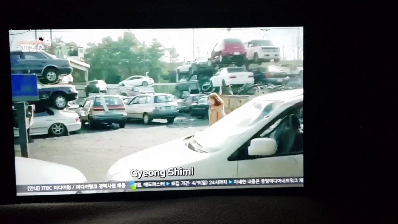 Strong Girl lifts car