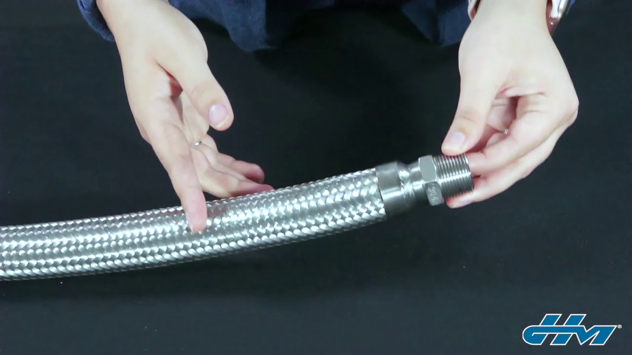 When should you use a guard or liner in a hose assembly?