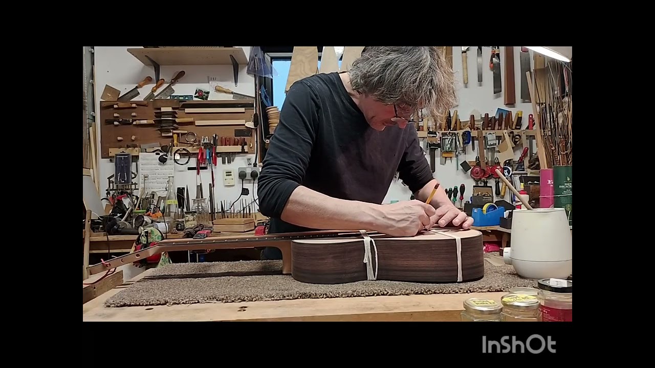 Gluing the Bridge of a Classical Guitar 