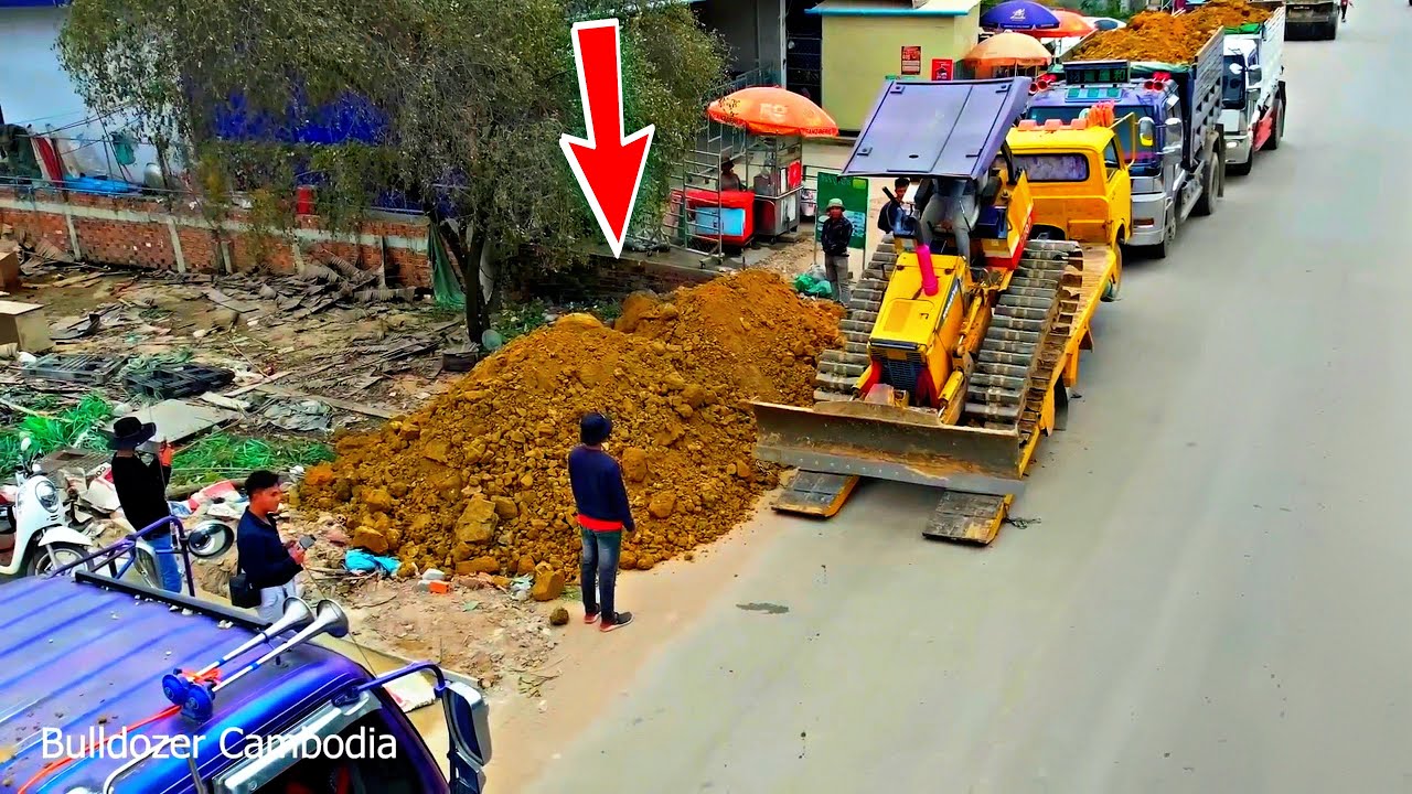 Complete100%! Starting a new project,Landfill by bulldozer D20 Komatsu Pushing stone & 5ton truck