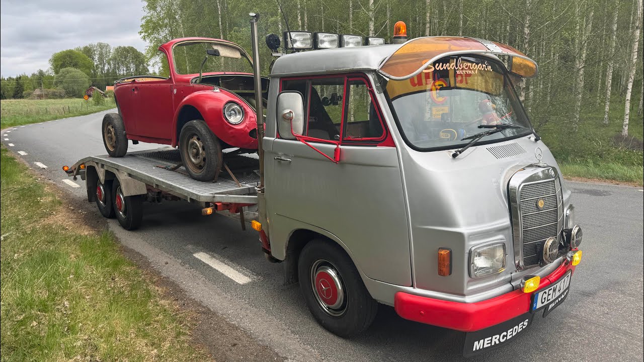Hämtning av framvagn med bil på.