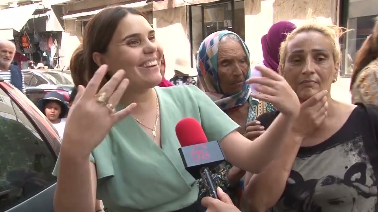تشنج أمام الكاميرا: امراة تتهجم على المذيعة وعلى مواطنين بالخارج.. بلادنا كل شي بالأكتاف وأدفع أدفع!