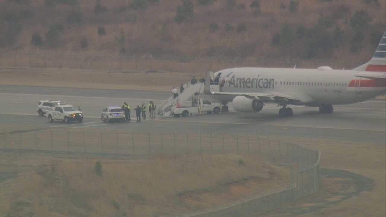 Suspect arrested for making bomb threat onboard plane leaving Charlotte Douglas airport | WSOC-TV