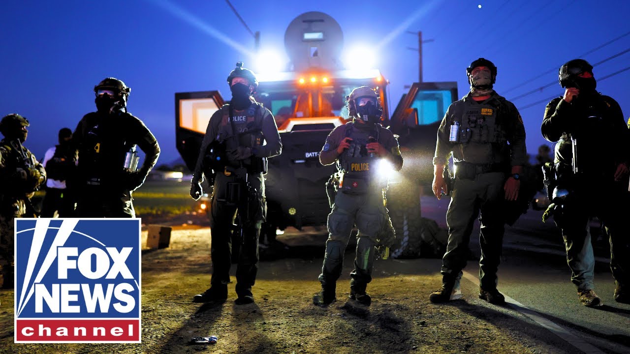Trump orders agents to fight back 'using whatever means necessary' after raid