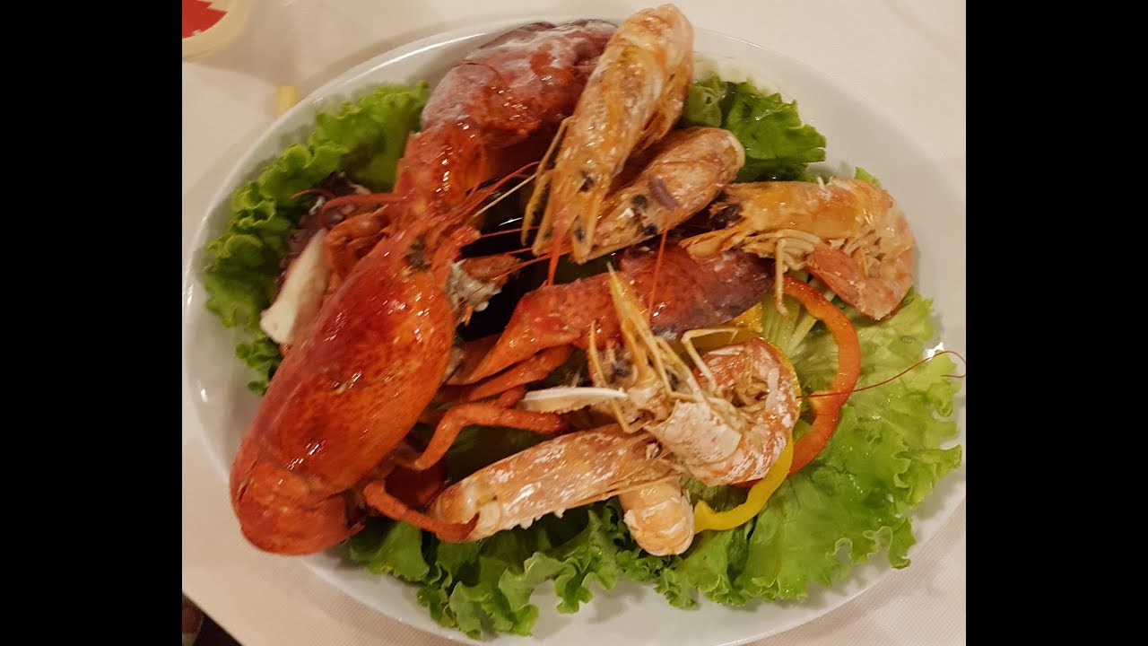 L'astice e molluschi al La Bianca.Покушали омаров и моллюсков в ресторане Ла Бьянка