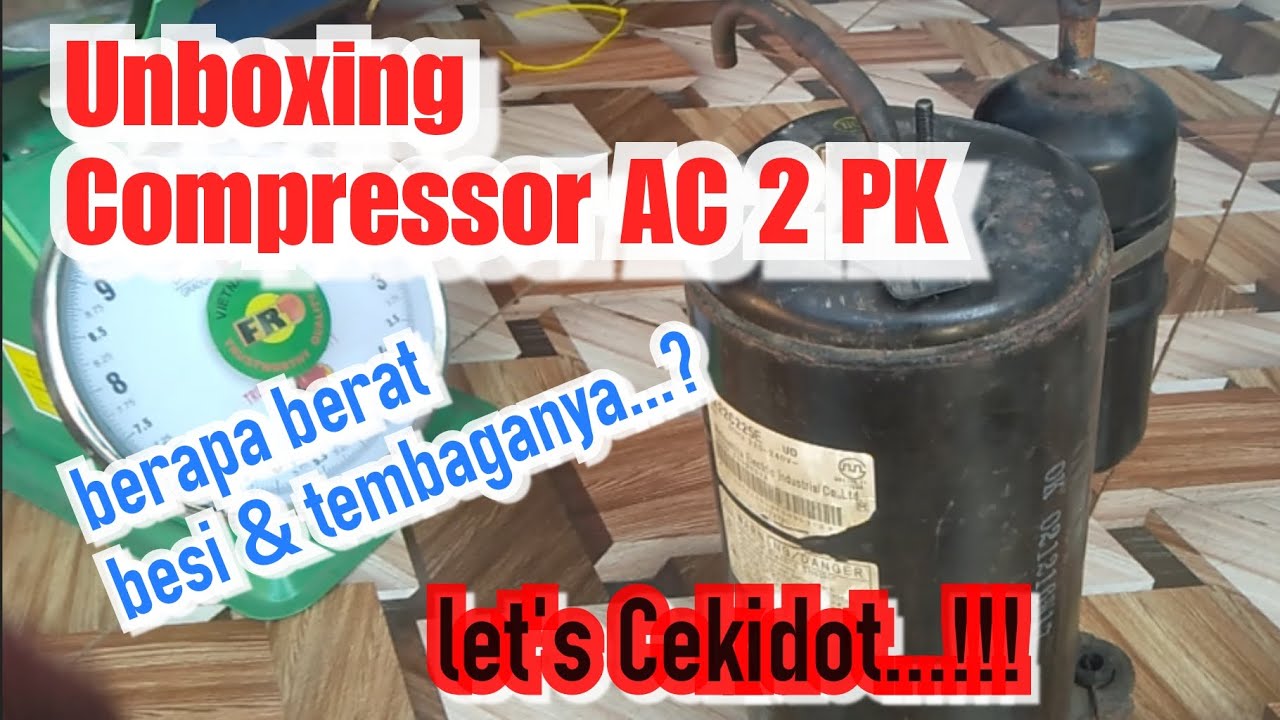 Melihat isi dalam compressor ac 2PK dan menimbang berat besi dan tembaganya