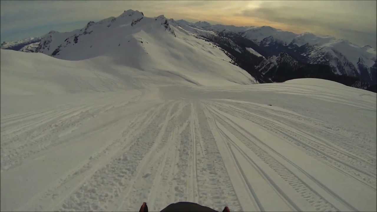 Snowmobiling near Whistler BC from the top of the Chocolate Bowl, to Brandywind Staging area.