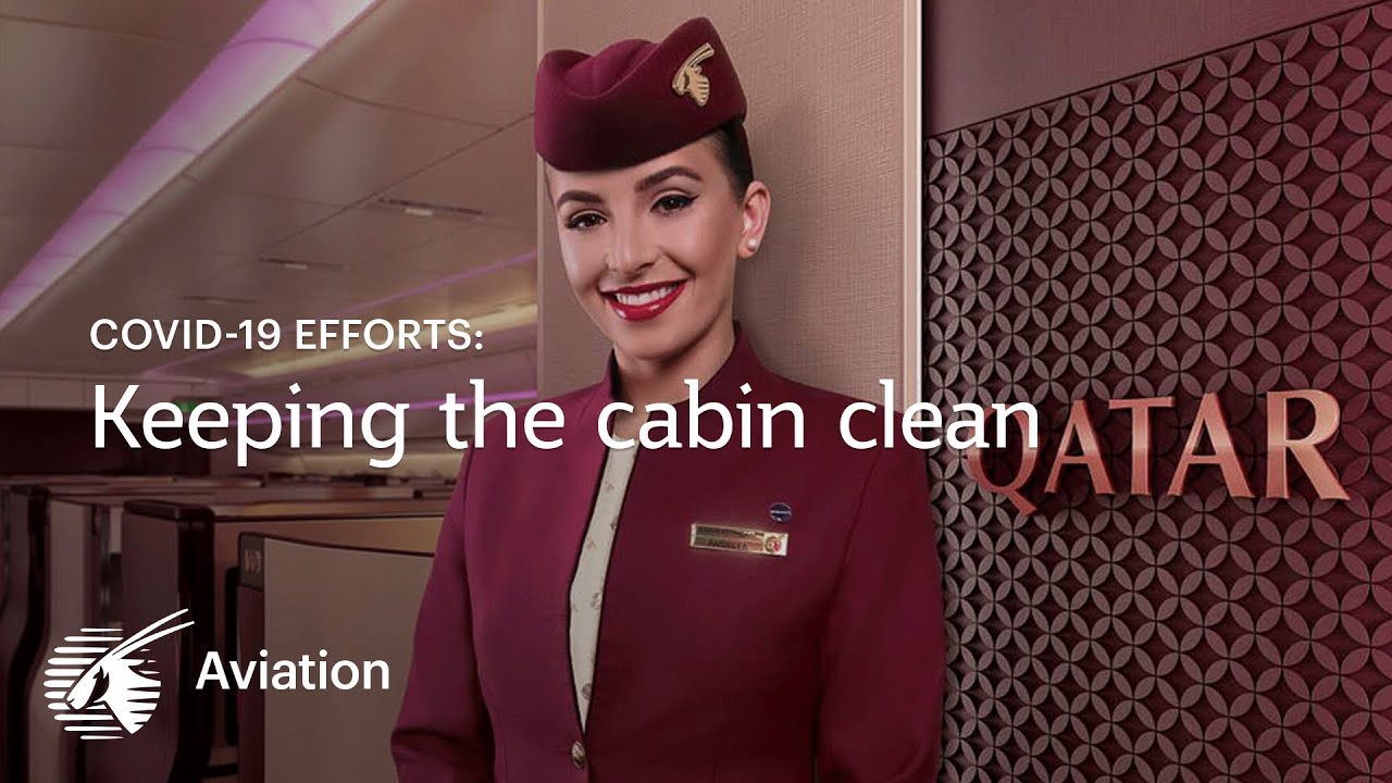 Cleaning the aircraft cabin interiors of a Qatar Airways aircraft