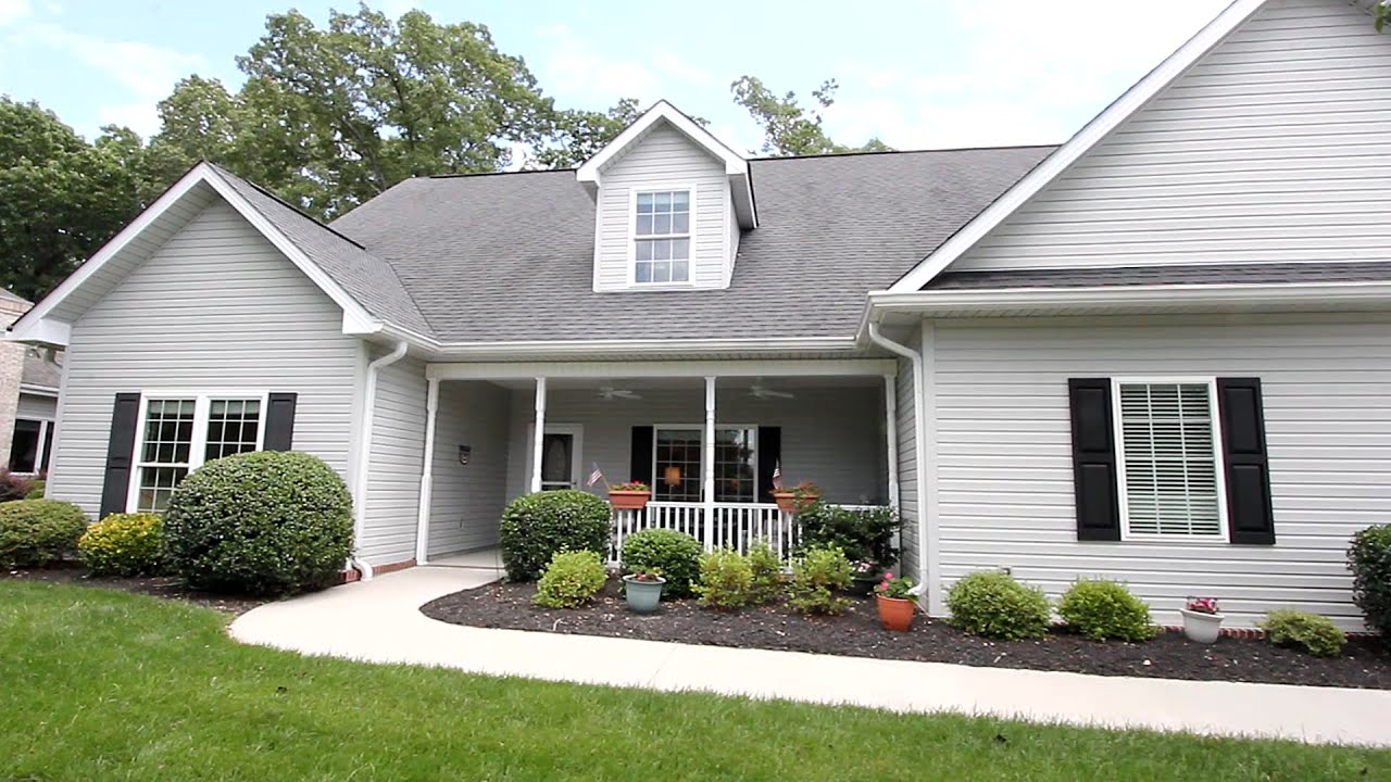 One level living on level lot in Tellico Village at 120 Kenosha Ln