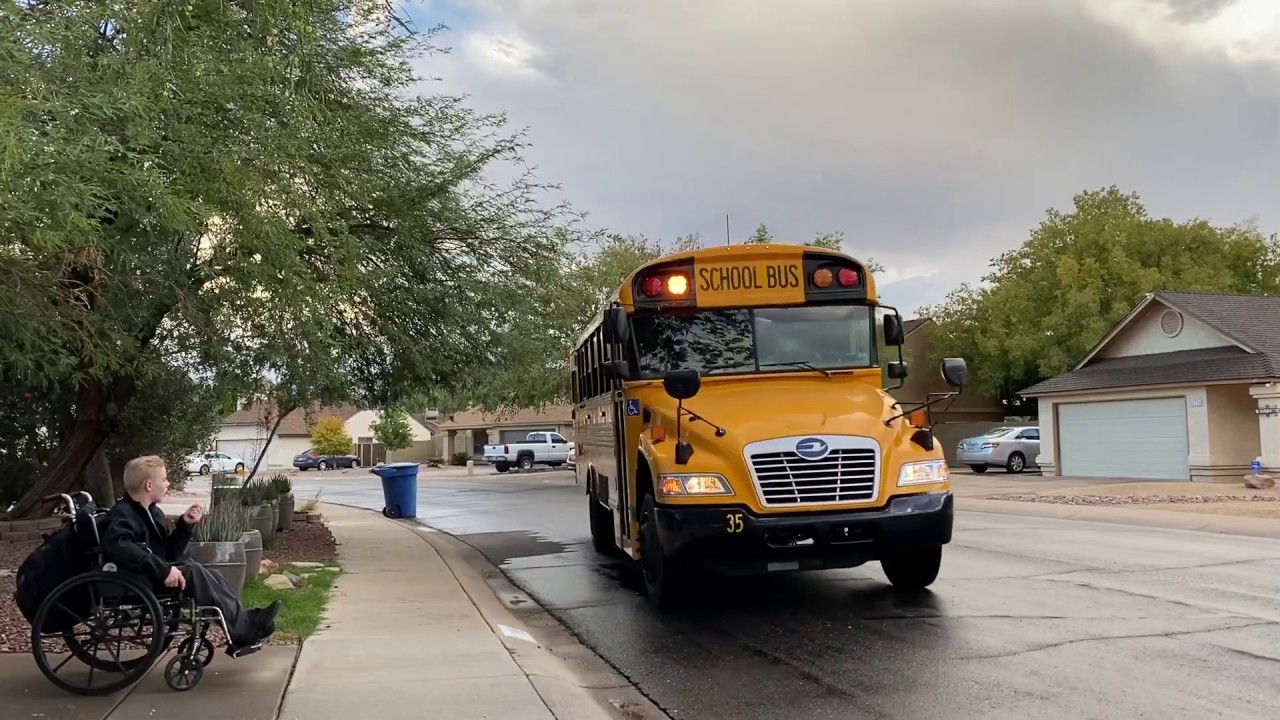 Rainy day school bus for Sagan
