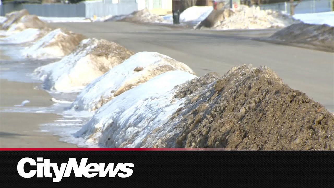Edmonton’s Phase 2 Parking Ban ends as residents look to clear windrows