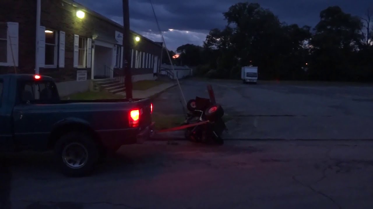 Random Video: Dragging a Lawnmower with a Truck