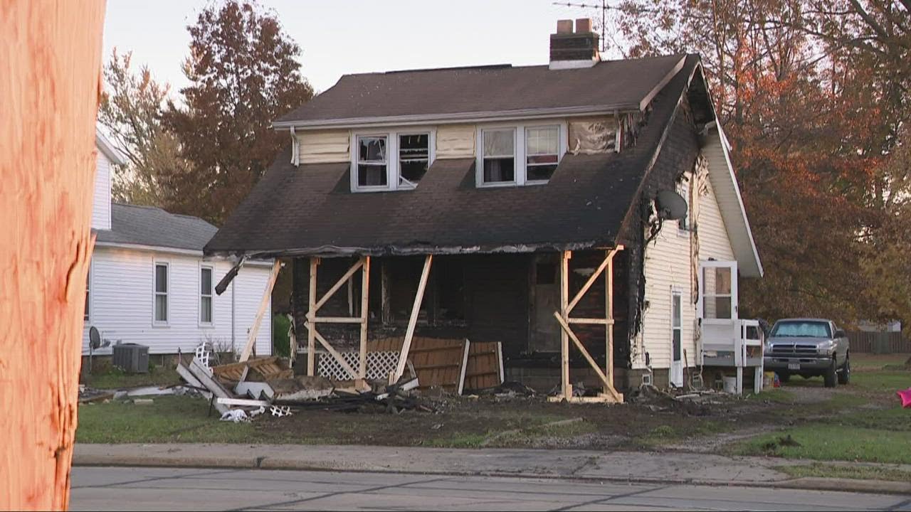 Dump truck crashes into house in Willoughby; passenger in vehicle killed