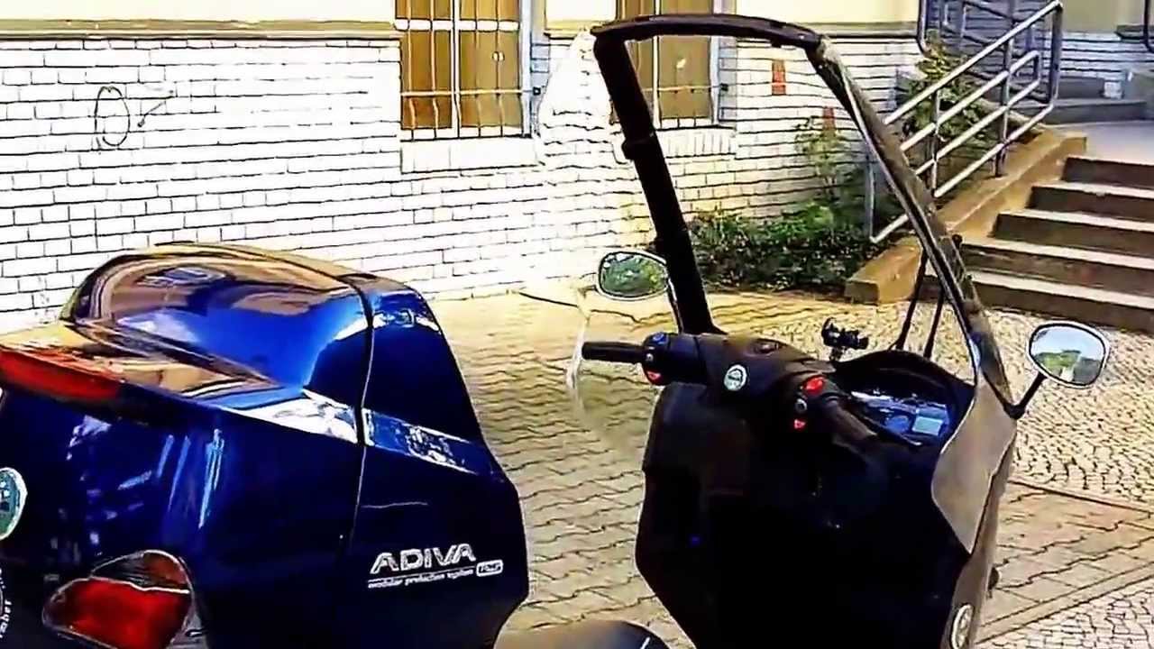 Regenschutz, die Benelli adiva der Roller, mit dem man trocken durch den Regen fahren kann