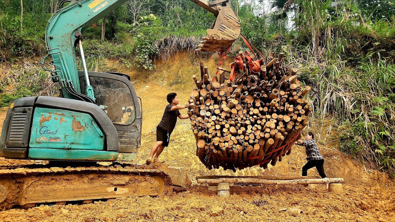 The process of leveling the ground and transporting the complete firewood storage.