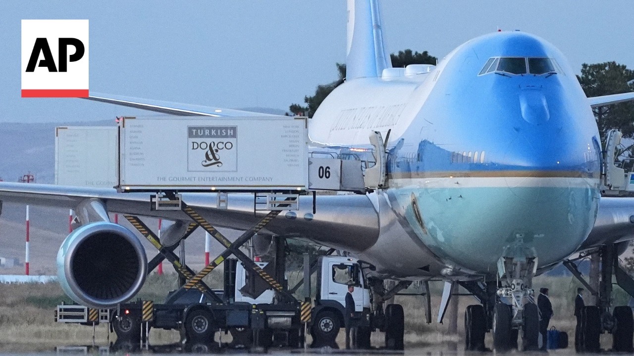 AP photographer describes capturing catering vehicles that Trump used to switch planes
