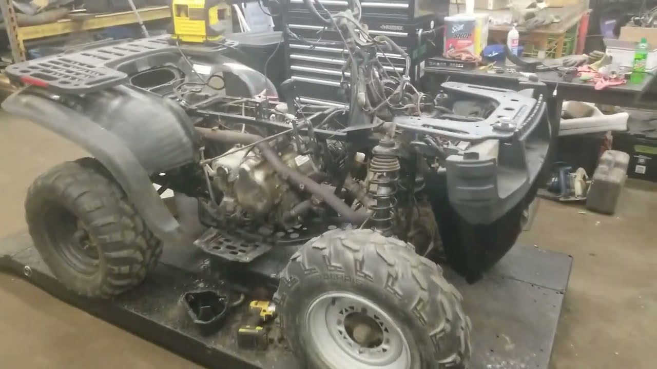 Polaris Sportsman 700 lifters ticking and only runs when the choke is pulled. Find out why! Part 1.