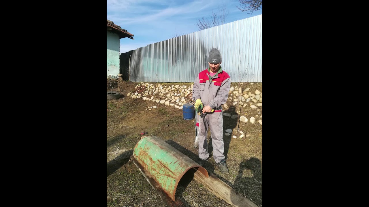 Încărcător în tiranti
