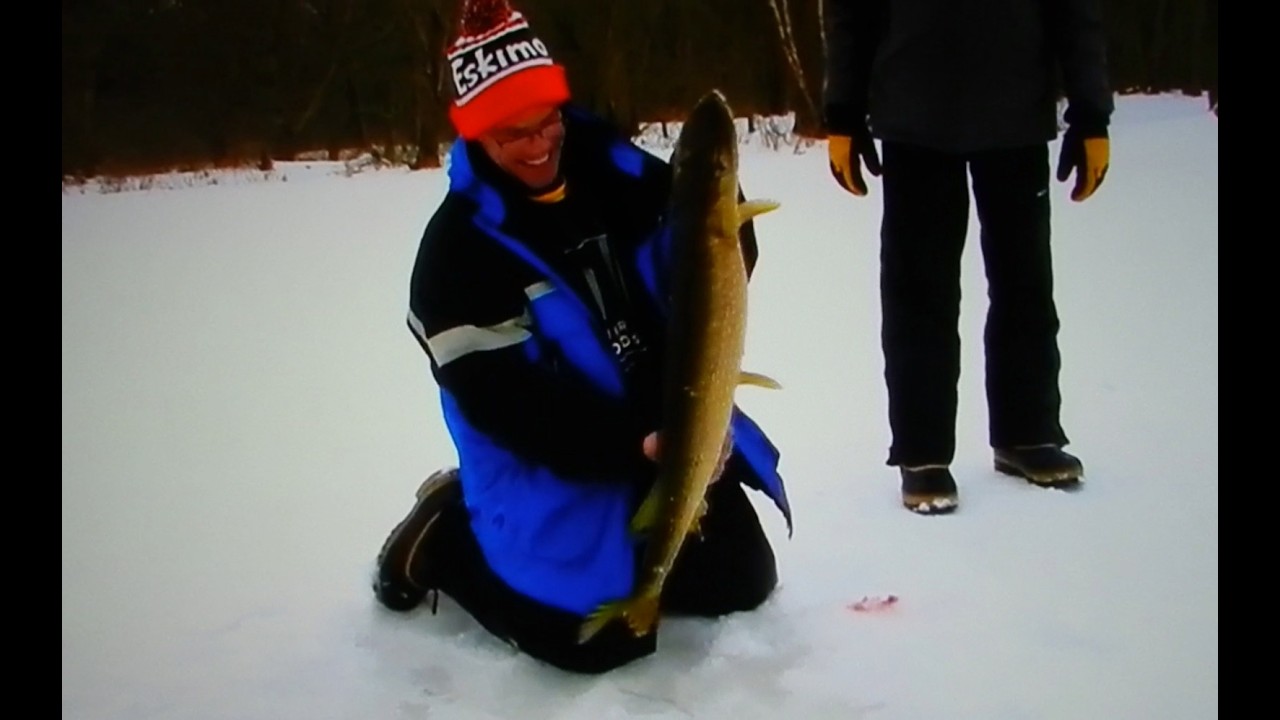 Gant Outdoors. Ice fishing a slough of the Wisconsin River. Spring Green Wisconsin area.