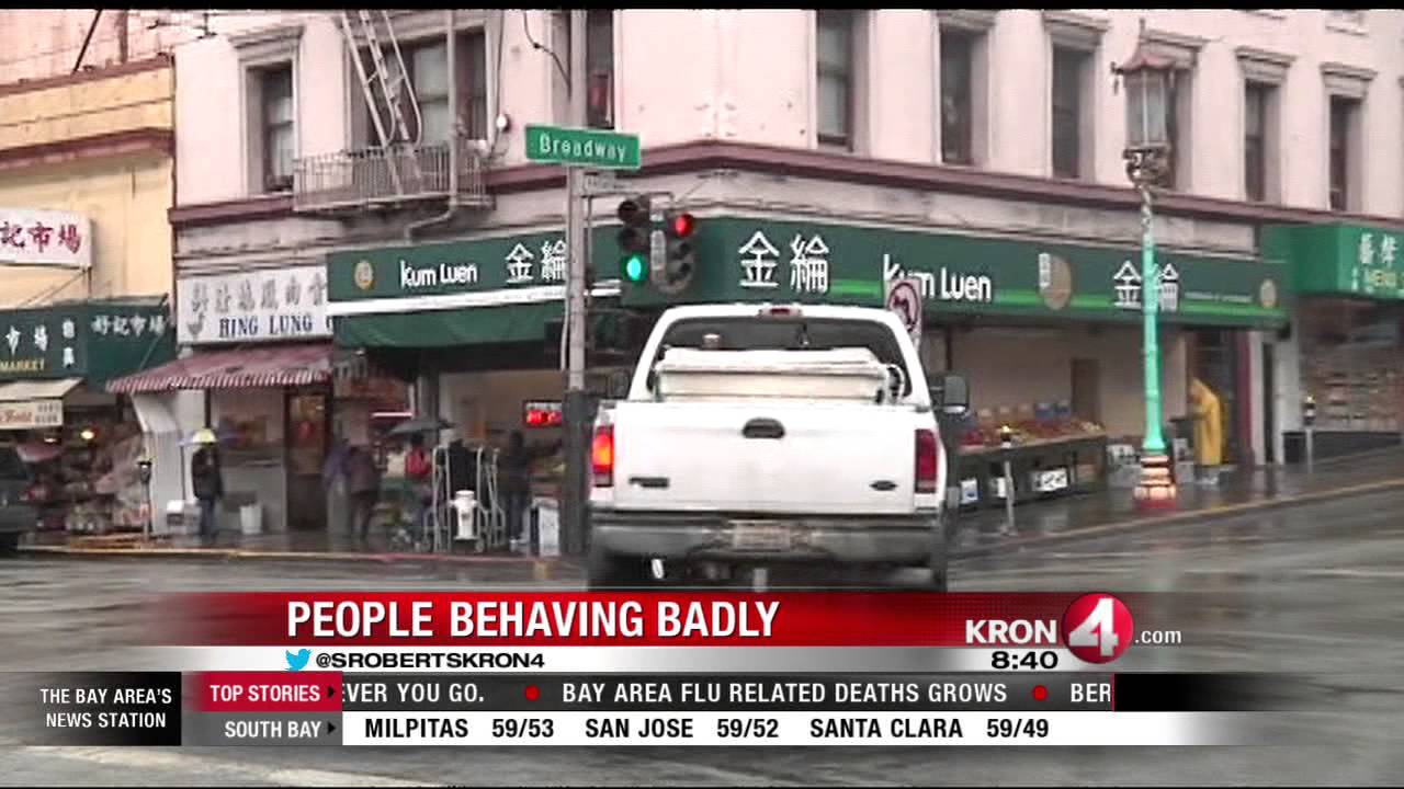 Plenty of People Found Behaving Badly on a Rainy Day in Chinatown