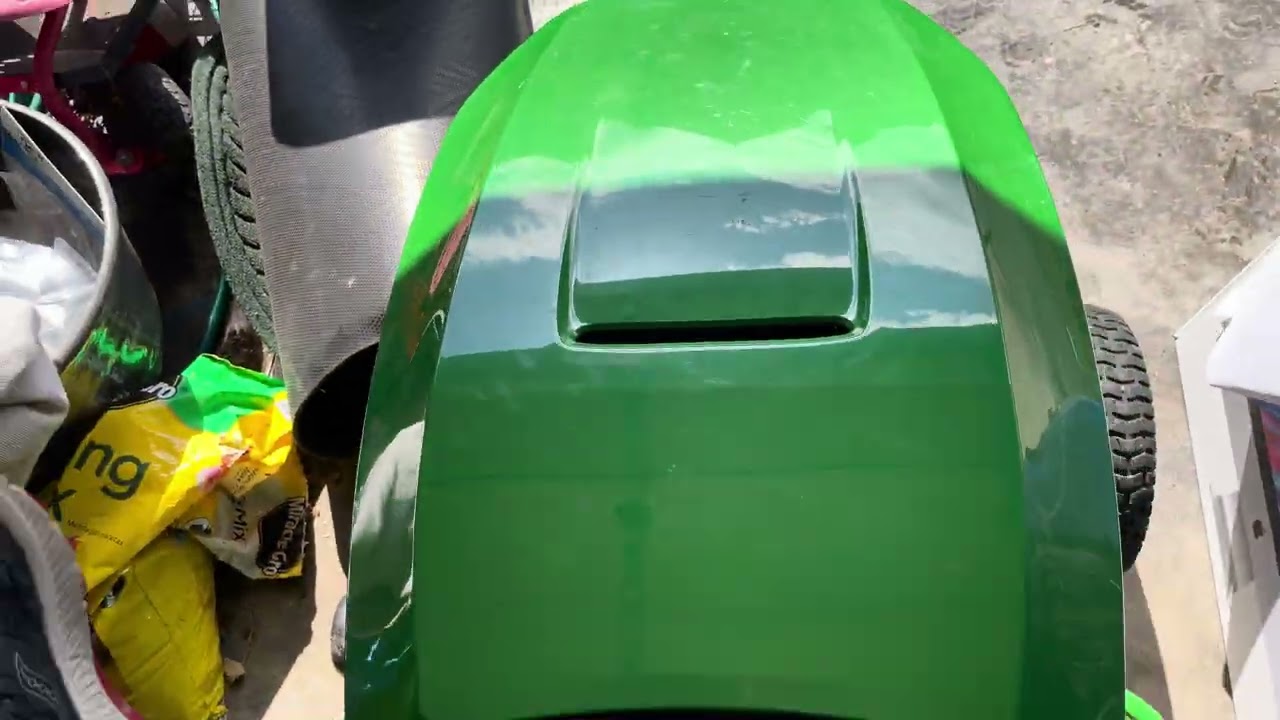 Shiny John Deere in the spring sun weather