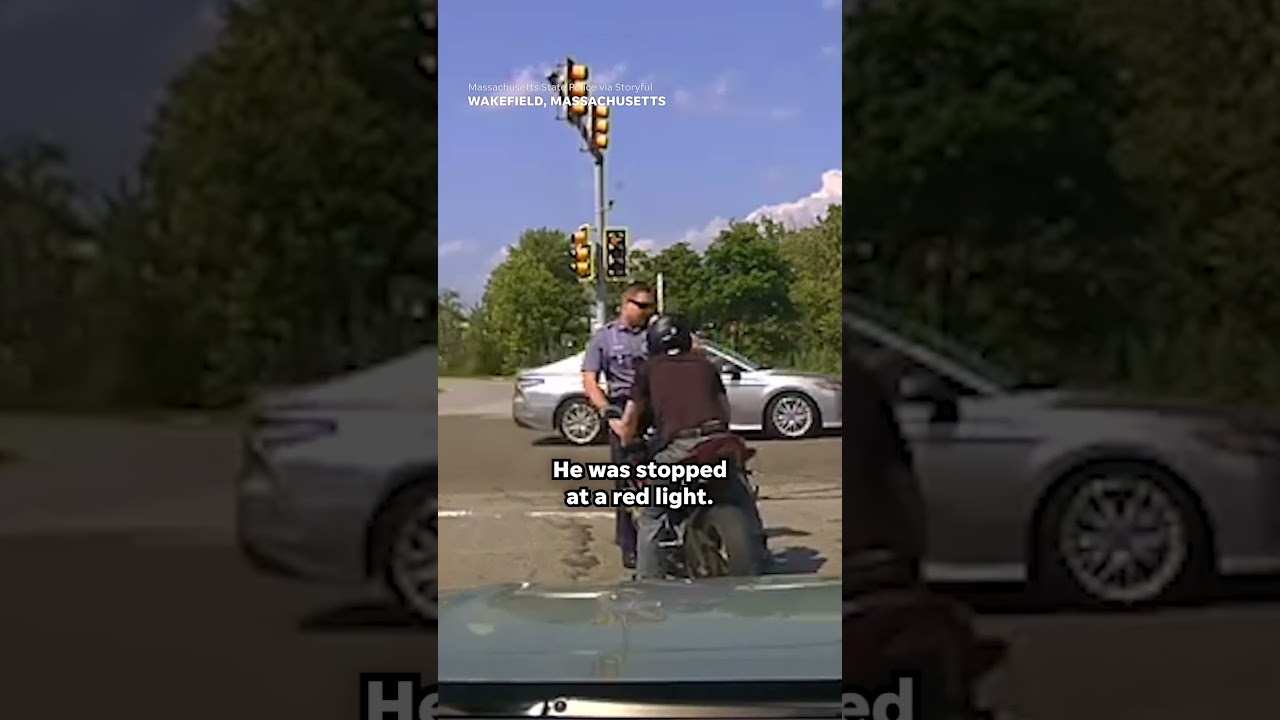 Motorcyclist drives state trooper into oncoming traffic #Shorts