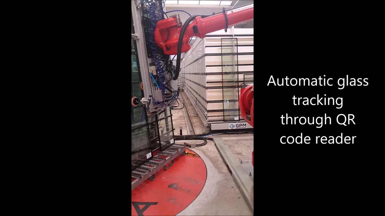 Storing and sorting system with high speed shuttle and robotic loading