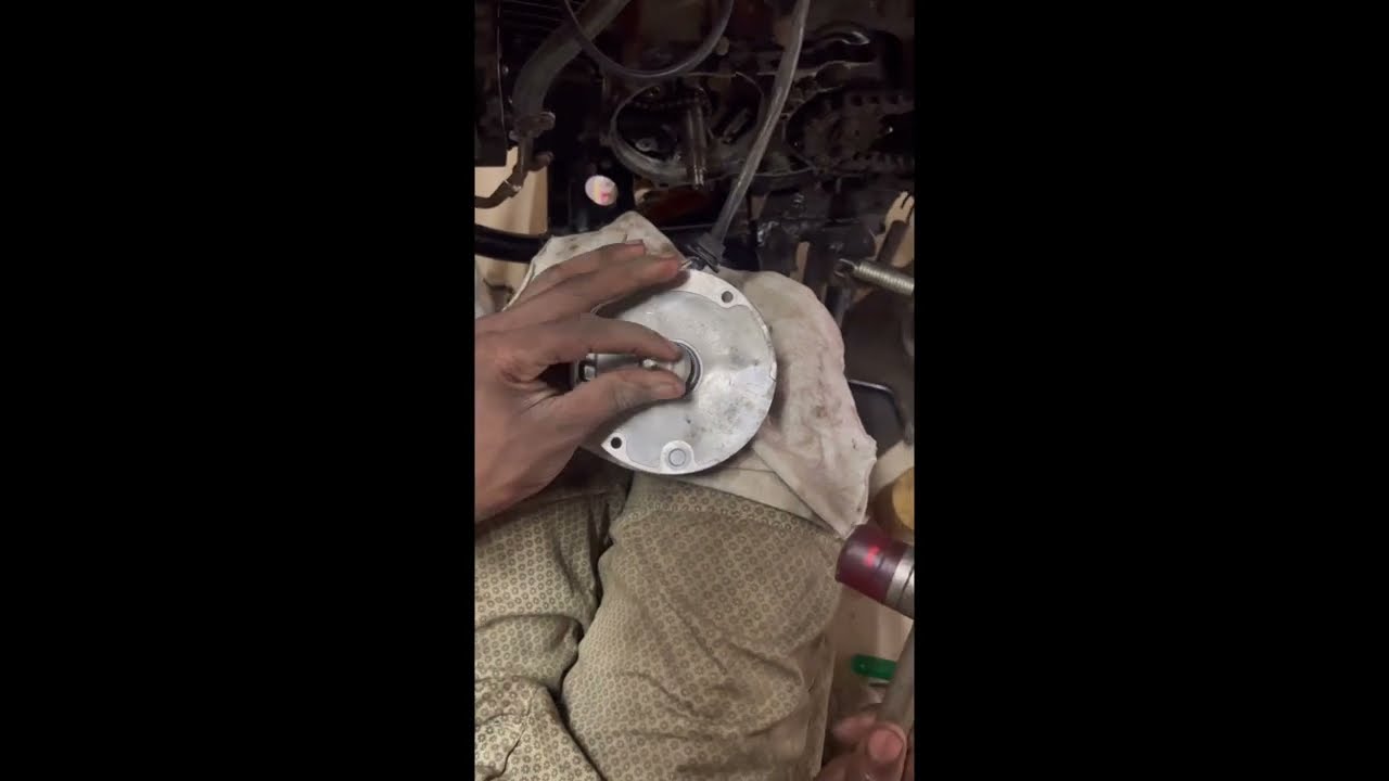 Splendor magnet coil plate oil seal change