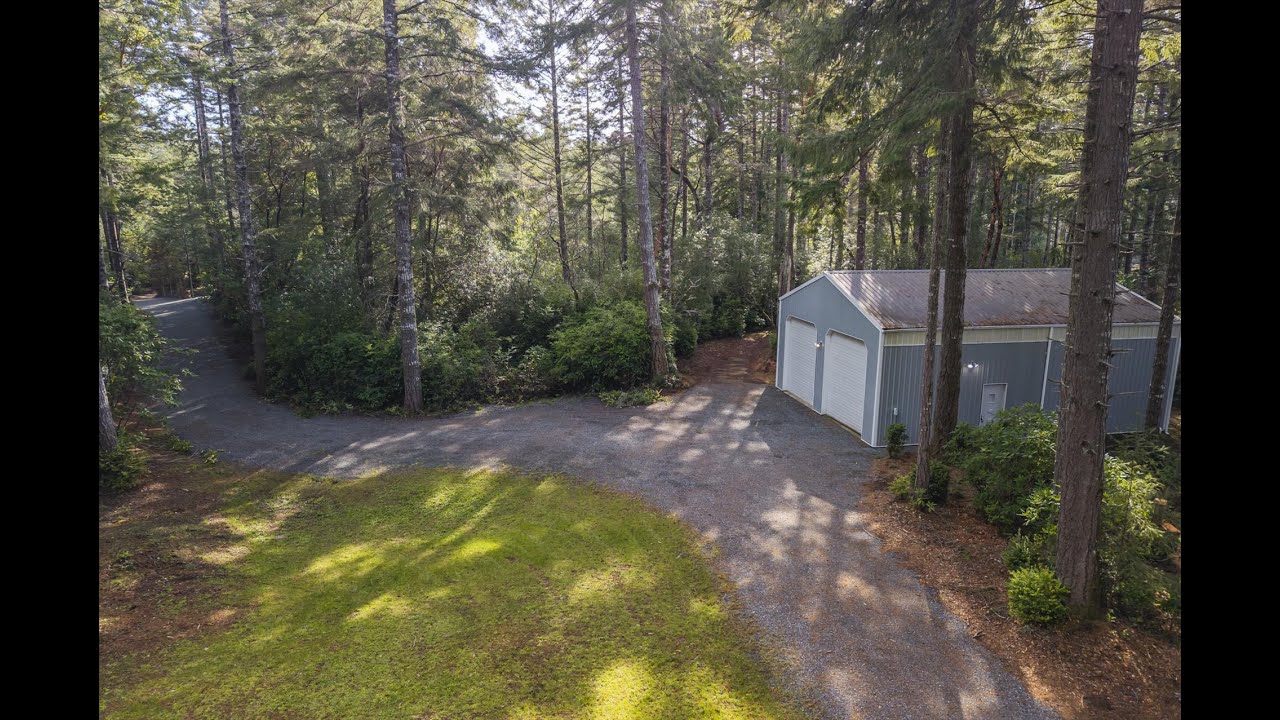 4.01 ACRE BANDON FORESTED DEVELOPED HOMESITE WITH SHOP!