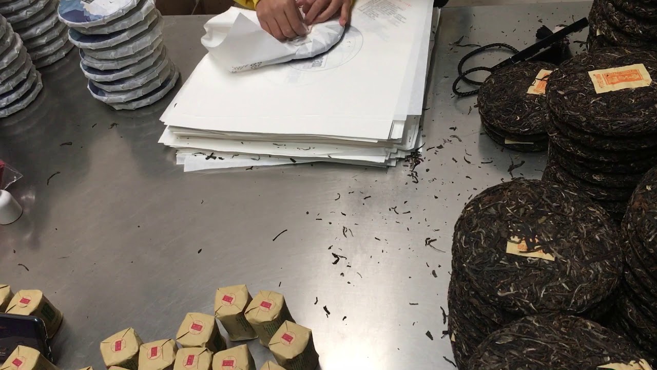 普洱茶餅包裝紙包法