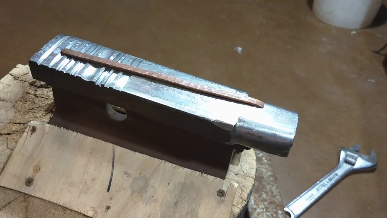 TL Hand Forges and Stamps a Copper Cuff Bracelet