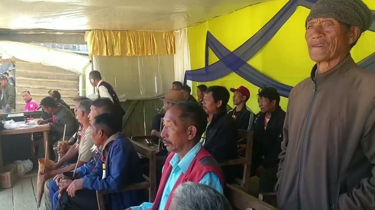 Village elders cheering football in folksong at chingmei  poang lüm. 