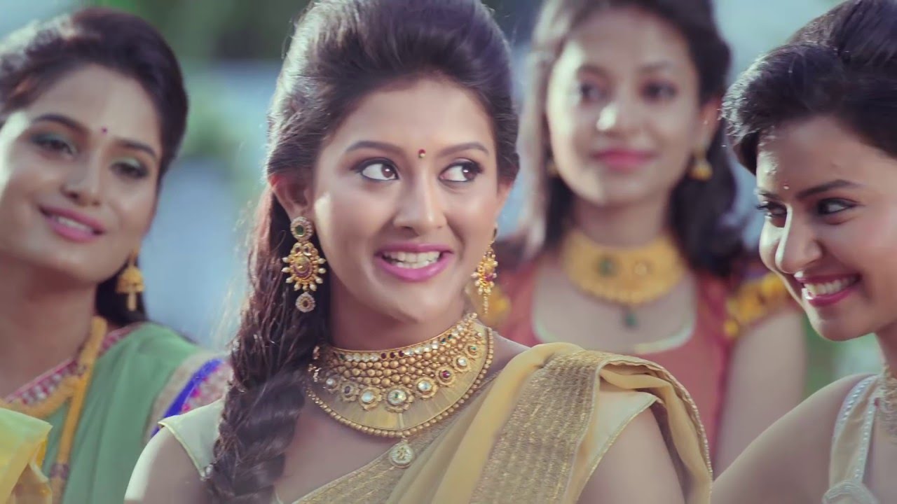 Sree Kumaran Thangamaligai Mangalya ad 2015