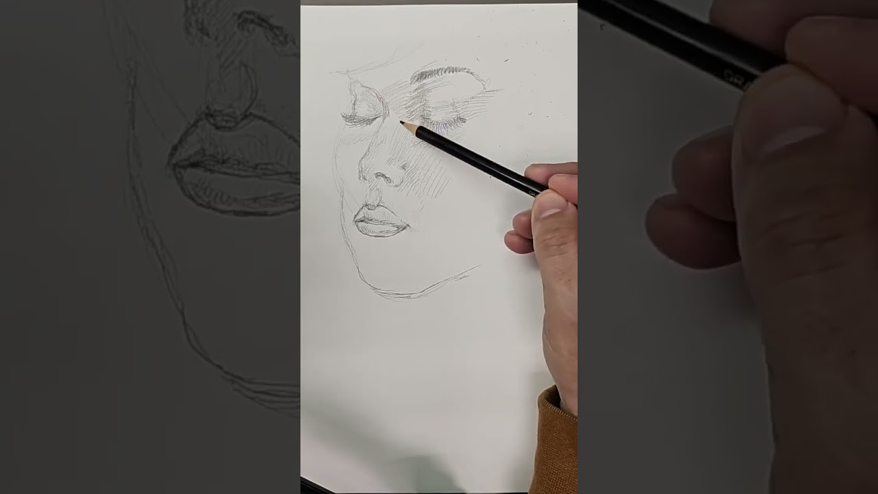 Drawing practice using pencil on paper of eyes closed 