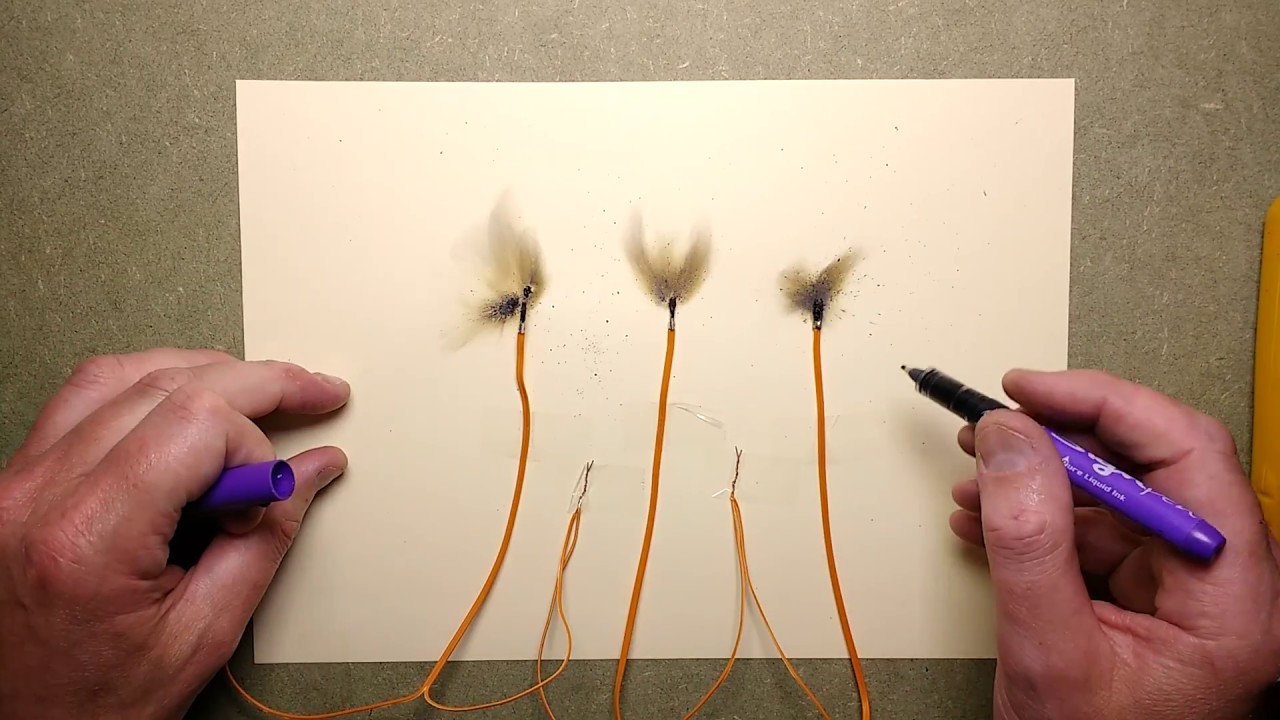 Testing for electric match misfire.  (bangs and flames)
