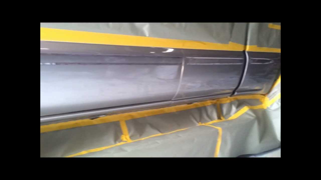 GMC Sierra rocker panels sprayed with Rhino Lining coating