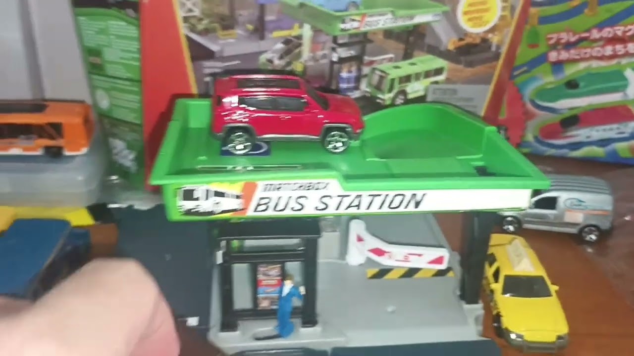 Stress testing the Matchbox Action Driver's Bus Station with multiple diecast buses.