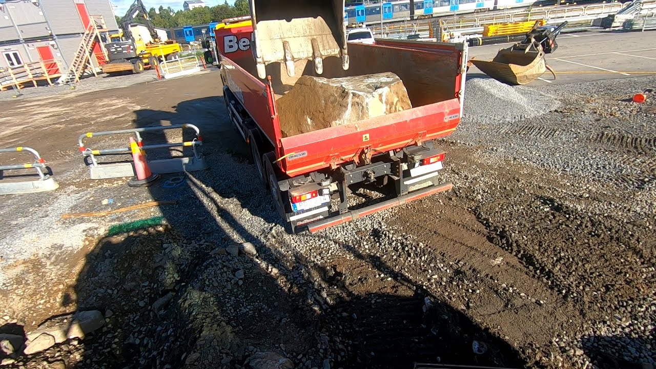 Volvo 300E excavator loading 3 axle trucks!