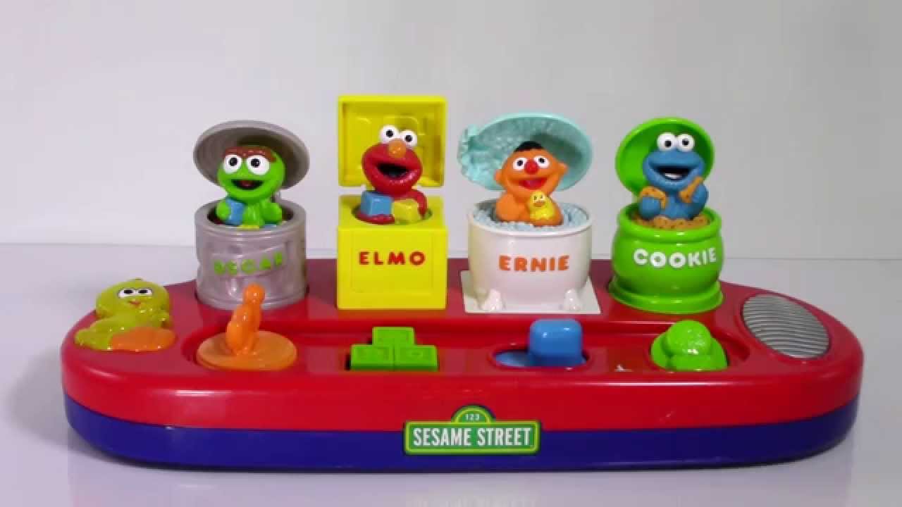 Sesame Street Singing Pop Up Pals Toy - Oscar, Elmo, Ernie, Cookie Monster, Big Bird
