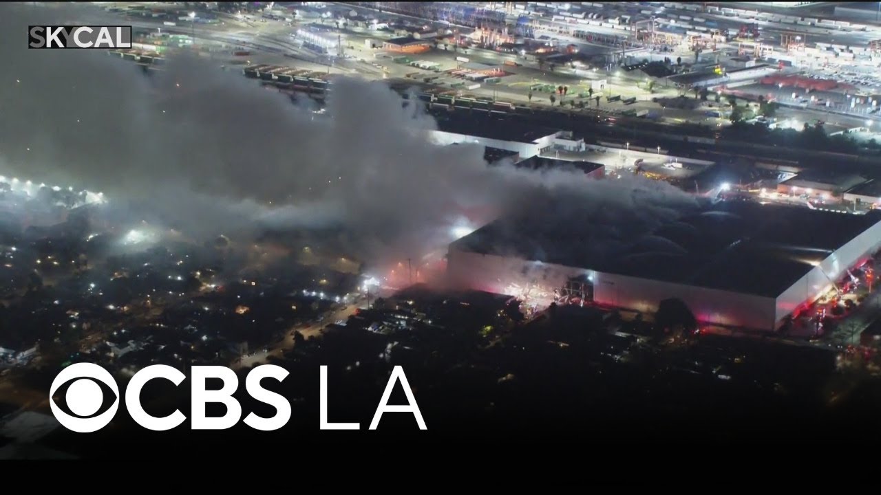 Smoke continues to billow from Boyle Heights warehouse fire